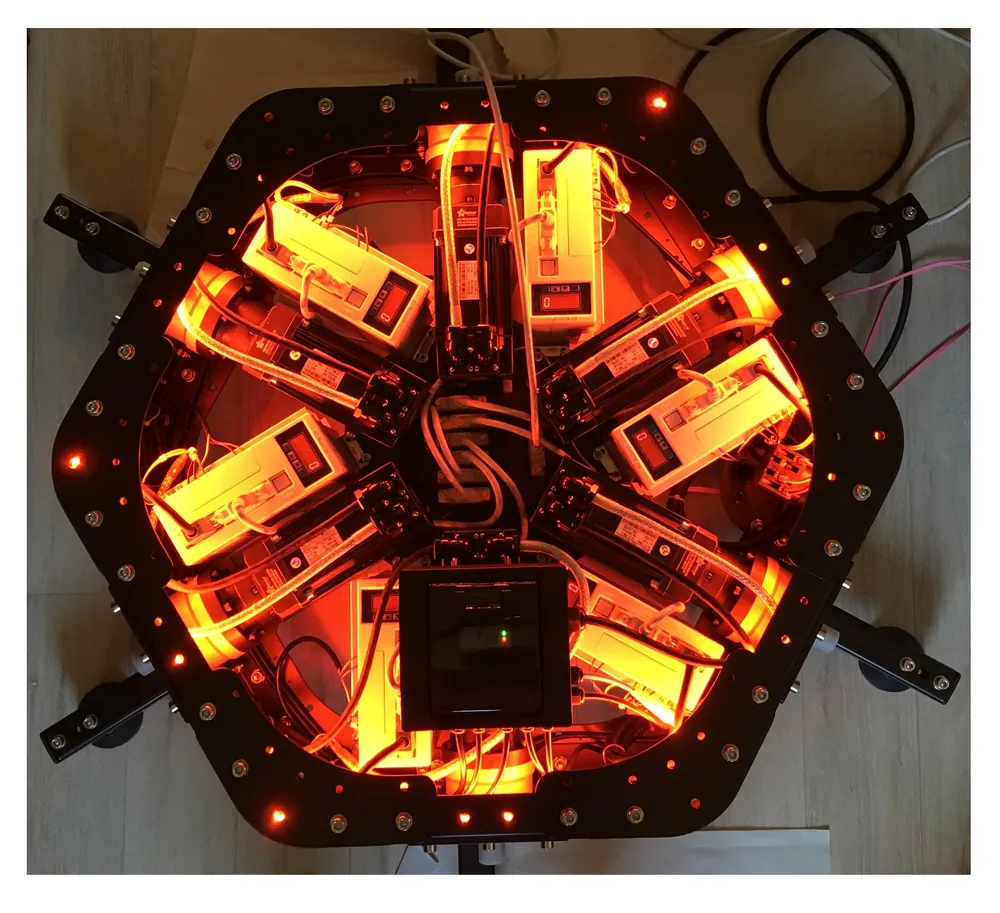 Inside the base: six servo drives and the LED strip